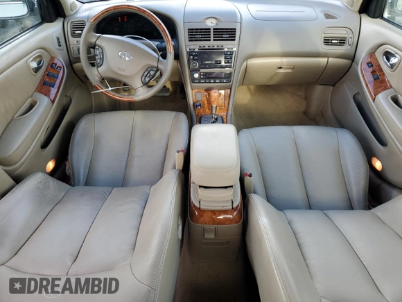 2003 Infiniti I35 Luxury z VIN JNKDA31A23T101548, wystawiony jako Copart lot #80850964 z przebiegiem 158 963 mil mil oraz Czysty tytuł • Clean title. Historia ofert i sprzedaży dostępna na DreamBid. Obrazek 8.