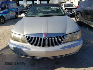 2001 Lincoln Continental with VIN 1LNHM97V31Y641106, listed as a Copart auction lot 77468194 with 86,363 mi miles and Clean Title. Bid and sale history available at carsss.com. Image 5.