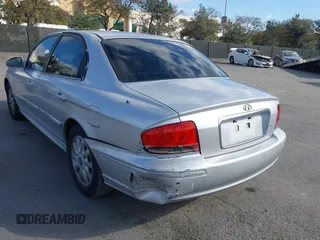 2003 Hyundai Sonata GLS with VIN KMHWF35H93A897855, listed as a IAAI auction lot 41527610 with 122,010 mi miles. Bid and sale history available at carsss.com. Image 6.