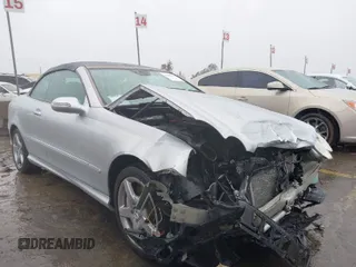 2007 Mercedes-Benz CLK 5.5L with VIN WDBTK72F57T081022, listed as a IAAI auction lot 41572811 with 82,776 mi miles. Bid and sale history available at carsss.com. Image 1.
