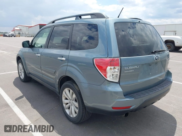 2013 Subaru Forester X Limited with VIN JF2SHAECXDH428595, listed as a IAAI auction lot 42373233 with 135,860 mi miles and . Bid and sale history available at DreamBid. Image 3.