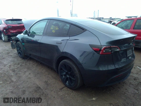 2024 Tesla Model Y Long Range z VIN 7SAYGDEE7RA214802, wystawiony jako IAAI lot #41118623 z przebiegiem 12 336 mil mil oraz . Historia ofert i sprzedaży dostępna na DreamBid. Obrazek 3.