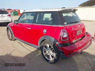 2013 MINI Hardtop S with VIN WMWSV3C56DT392499, listed as a IAAI auction lot 41855073 with 55,403 mi miles and . Bid and sale history available at DreamBid. Image 3.