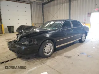 2010 Lincoln Town Car Signature Limited z VIN 2LNBL8CVXAX615448, wystawiony jako Copart lot #55143285 z przebiegiem 77 780 mil mil oraz Szkoda całkowita • Salvage title. Historia ofert i sprzedaży dostępna na DreamBid. Obrazek 1.