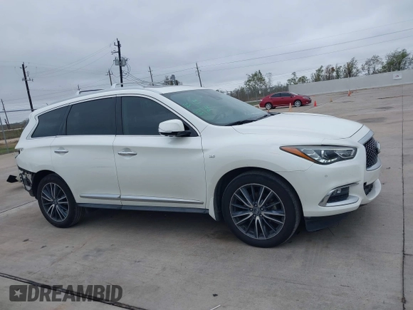 2019 Infiniti QX60 LUXE with VIN 5N1DL0MN2KC551218, listed as a IAAI auction lot 41101804 with 111,621 mi miles. Bid and sale history available at carsss.com. Image 13.