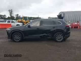 2020 Mazda CX-9 Touring with VIN JM3TCBCY5L0422262, listed as a IAAI auction lot 42456246 with 69,211 mi miles and . Bid and sale history available at DreamBid. Image 14.