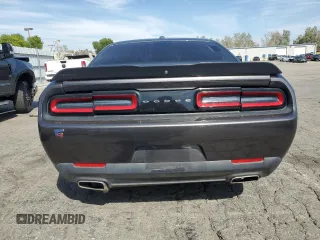 2019 Dodge Challenger SXT z VIN 2C3CDZAG2KH699815, wystawiony jako Copart lot #50547245 z przebiegiem 43 124 mil mil oraz Nie do naprawy • Non repairable. Historia ofert i sprzedaży dostępna na DreamBid. Obrazek 6.