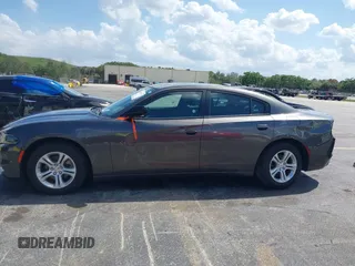 2023 Dodge Charger SXT with VIN 2C3CDXBG0PH571518, listed as a IAAI auction lot 42026774 with 47,394 mi miles and . Bid and sale history available at DreamBid. Image 14.