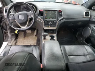 2014 Jeep Grand Cherokee Summit с VIN 1C4RJFJG4EC427075, выставлен на аукционе Copart как лот 49504095 с пробегом 147 342 миль миль и Списание • Salvage title. История ставок и продаж доступна на DreamBid. Изображение 8.