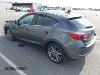 2018 Mazda 3 Touring with VIN 3MZBN1L32JM268582, listed as a IAAI auction lot 42072435 with 61,417 mi miles. Bid and sale history available at carsss.com. Image 3.