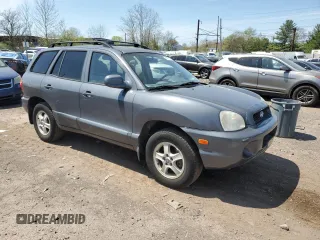 2001 Hyundai Santa Fe GLS with VIN KM8SC83D41U069325, listed as a Copart auction lot 54377815 with 51,574 mi miles and Clean Title. Bid and sale history available at carsss.com. Image 4.