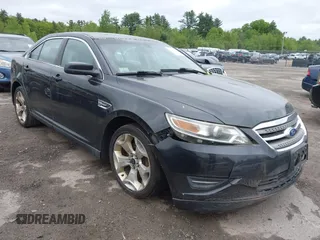 2011 Ford Taurus SEL z VIN 1FAHP2HW4BG122959, wystawiony jako IAAI lot #42312344 z przebiegiem 193 561 mil mil oraz . Historia ofert i sprzedaży dostępna na DreamBid. Obrazek 1.