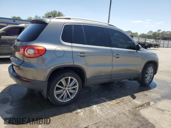 2011 Volkswagen Tiguan SE with VIN WVGBV7AX2BW561987, listed as a Copart auction lot 55385195 with 146,907 mi miles and Salvage Title. Bid and sale history available at DreamBid. Image 3.
