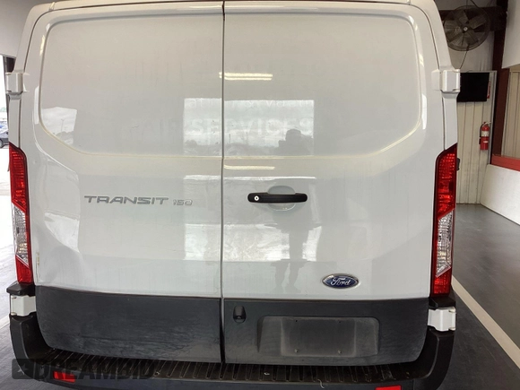 2020 Ford Transit Cargo with VIN 1FTYE1Y8XLKB20773, listed as a IAAI auction lot 42147735 with 206,663 mi miles and . Bid and sale history available at DreamBid. Image 1.
