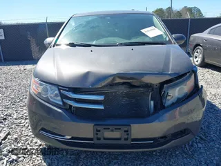 2014 Honda Odyssey EX-L with VIN 5FNRL5H61EB014695, listed as a IAAI auction lot 41694860 with 261,265 mi miles and . Bid and sale history available at DreamBid. Image 12.