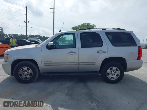 2010 Chevrolet Tahoe LT with VIN 1GNUCBE04AR279051, listed as a IAAI auction lot 41842291 with 227,227 mi miles and . Bid and sale history available at DreamBid. Image 14.