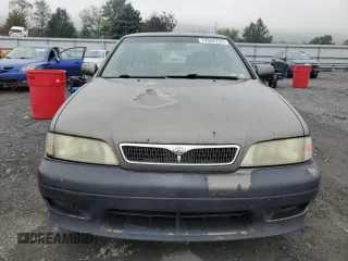 2000 Infiniti G20 Luxury z VIN JNKCP11A1YT304887, wystawiony jako Copart lot #74562724 z przebiegiem 202 140 mil mil oraz Czysty tytuł • Clean title. Historia ofert i sprzedaży dostępna na DreamBid. Obrazek 5.