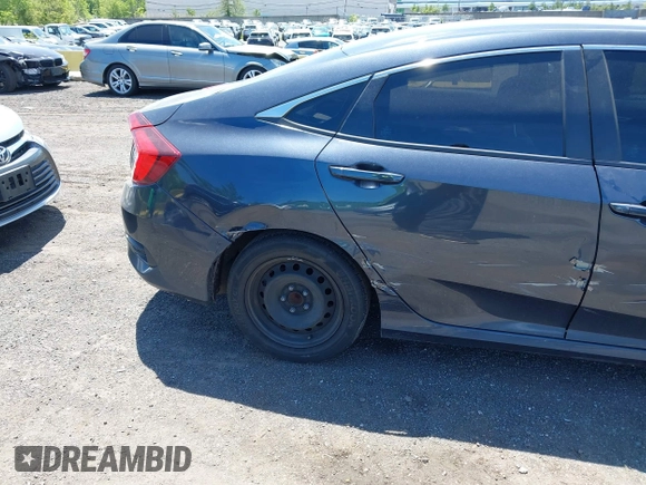 2020 Honda Civic LX z VIN 2HGFC2F61LH567246, wystawiony jako IAAI lot #42290361 z przebiegiem 50 388 mil mil oraz . Historia ofert i sprzedaży dostępna na DreamBid. Obrazek 17.