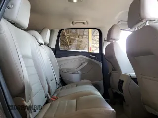 2014 Ford Escape Titanium с VIN 1FMCU0J91EUA21918, выставлен на аукционе Copart как лот 59161865 с пробегом 118 003 миль миль и Списание • Salvage title. История ставок и продаж доступна на DreamBid. Изображение 10.