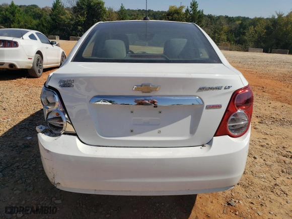 2016 Chevrolet Sonic LT with VIN 1G1JC5SB1G4184884, listed as a Copart auction lot 74928674 with 82,697 mi miles and Salvage Title. Bid and sale history available at carsss.com. Image 6.