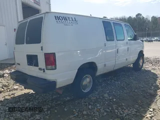 2005 Ford Econoline Cargo with VIN 1FTNE24L15HA46713, listed as a IAAI auction lot 41727365 with 424,135 mi miles. Bid and sale history available at carsss.com. Image 4.
