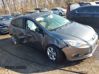 2013 Ford Focus SE with VIN 1FADP3K28DL323879, listed as a IAAI auction lot 41449022 with 133,735 mi miles. Bid and sale history available at carsss.com. Image 1.