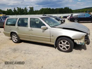 1999 Volvo V70 with VIN YV1LW55A2X2555888, listed as a Copart auction lot 58222784 with 205,133 mi miles and Salvage title. Bid and sale history available at DreamBid. Image 4.