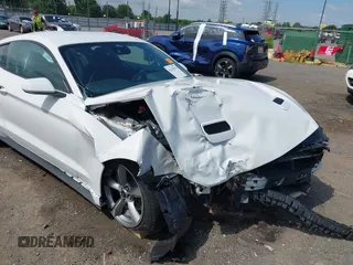 2021 Ford Mustang EcoBoost with VIN 1FA6P8THXM5153232, listed as a IAAI auction lot 42458757 with 45,267 mi miles and . Bid and sale history available at DreamBid. Image 6.