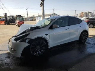 2022 Tesla Model Y Performance with VIN 7SAYGDEF8NF381644, listed as a Copart auction lot 44554585 with 71,413 mi miles and Salvage Title. Bid and sale history available at DreamBid. Image 1.
