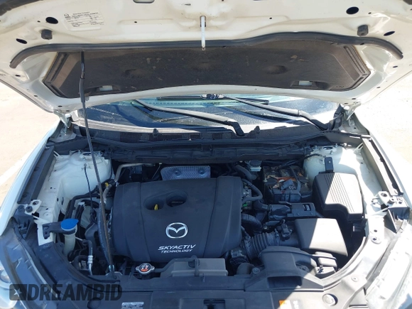 2015 Mazda CX-5 Grand Touring with VIN JM3KE2DYXF0493370, listed as a IAAI auction lot 42087156 with 161,464 mi miles. Bid and sale history available at carsss.com. Image 10.