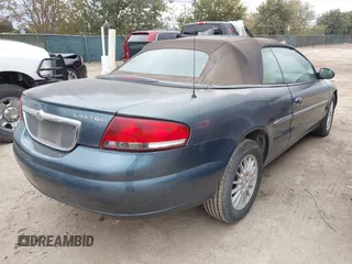 2002 Chrysler Sebring Limited with VIN 1C3EL65R72N201668, listed as a IAAI auction lot 41018612 with 143,931 mi miles and . Bid and sale history available at DreamBid. Image 4.