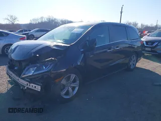 2019 Honda Odyssey EX-L with VIN 5FNRL6H77KB097835, listed as a IAAI auction lot 41768458 with 43,682 mi miles. Bid and sale history available at carsss.com. Image 2.