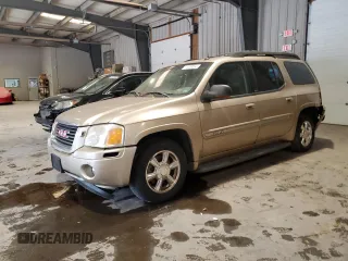 2004 GMC Envoy SLT with VIN 1GKET16S546158305, listed as a Copart auction lot 72409094 with 171,302 mi miles and Salvage Title. Bid and sale history available at DreamBid. Image 1.