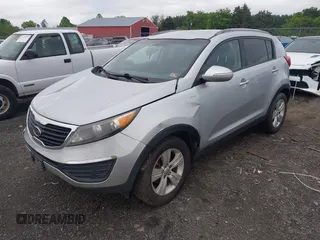 2012 Kia Sportage LX with VIN KNDPBCA25C7280598, listed as a IAAI auction lot 42223042 with 147,507 mi miles and . Bid and sale history available at DreamBid. Image 2.