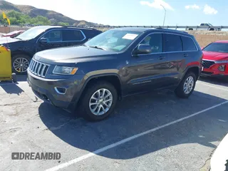 2016 Jeep Grand Cherokee Laredo z VIN 1C4RJFAG5GC390413, wystawiony jako IAAI lot #42254165 z przebiegiem 99 231 mil mil oraz . Historia ofert i sprzedaży dostępna na DreamBid. Obrazek 14.