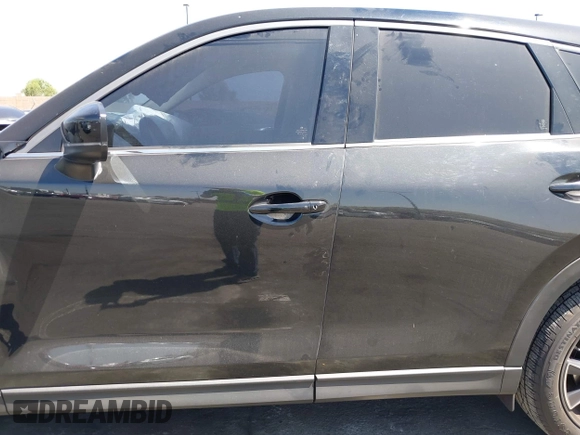 2018 Mazda CX-5 Grand Touring z VIN JM3KFADM7J0327272, wystawiony jako IAAI lot #42279536 z przebiegiem 97 478 mil mil oraz . Historia ofert i sprzedaży dostępna na DreamBid. Obrazek 14.