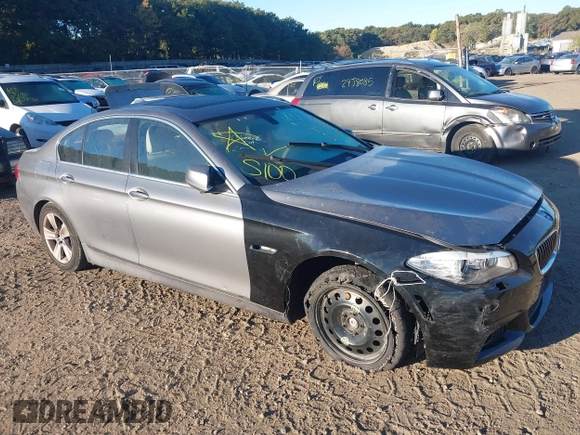 2013 BMW 5 Series 528i xDrive with VIN WBAXH5C5XDD112537, listed as a IAAI auction lot 40585977 with 999,999 mi miles. Bid and sale history available at carsss.com. Image 1.