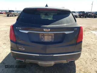 2017 Cadillac XT5 Platinum AWD z VIN 1GYKNFRS6HZ138810, wystawiony jako Copart lot #48029455 z przebiegiem 97 948 mil mil oraz Szkoda całkowita • Salvage title. Historia ofert i sprzedaży dostępna na DreamBid. Obrazek 6.