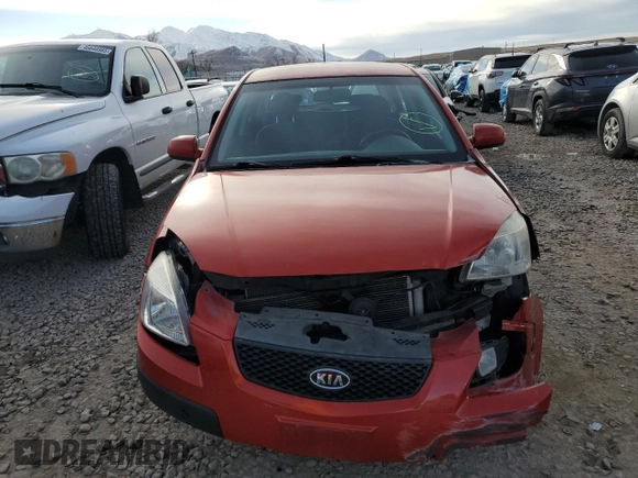 2009 Kia Rio LX with VIN KNADE243X96587429, listed as a Copart auction lot 46500825 with 116,557 mi miles and Salvage Title. Bid and sale history available at carsss.com. Image 5.