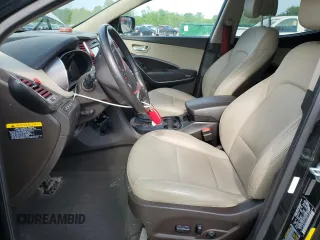 2017 Hyundai Santa Fe 2.4L z VIN 5XYZUDLB1HG412675, wystawiony jako Copart lot #57169045 z przebiegiem 38 947 mil mil oraz Szkoda całkowita • Salvage title. Historia ofert i sprzedaży dostępna na DreamBid. Obrazek 7.