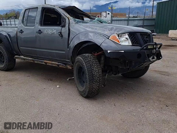 2008 Nissan Frontier LE with VIN 1N6AD09W58C437225, listed as a Copart auction lot 52687295 with 247,258 mi miles and Salvage title. Bid and sale history available at DreamBid. Image 13.