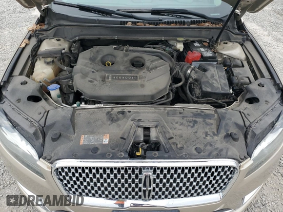 2017 Lincoln MKZ Premiere z VIN 3LN6L5A9XHR637903, wystawiony jako Copart lot #51170425 z przebiegiem 102 218 mil mil oraz Szkoda całkowita • Salvage title. Historia ofert i sprzedaży dostępna na DreamBid. Obrazek 11.