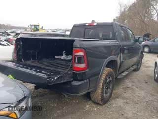 2019 Ram 1500 Rebel with VIN 1C6SRFLTXKN580782, listed as a IAAI auction lot 41498027 with 83,669 mi miles and . Bid and sale history available at DreamBid. Image 4.