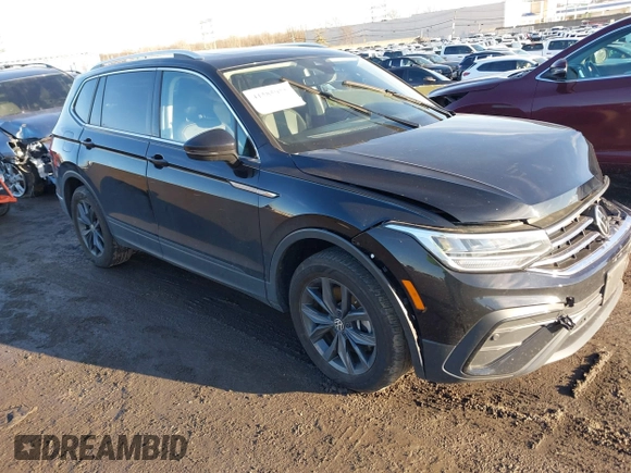 2023 Volkswagen Tiguan SE with VIN 3VVMB7AX8PM032557, listed as a IAAI auction lot 41585975 with 28,706 mi miles and . Bid and sale history available at DreamBid. Image 1.