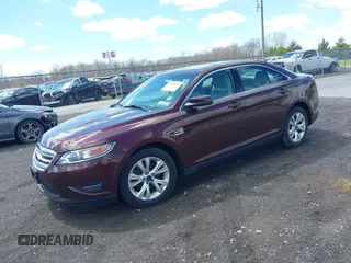 2012 Ford Taurus SEL with VIN 1FAHP2EW2CG140818, listed as a IAAI auction lot 42101815 with 55,323 mi miles and . Bid and sale history available at DreamBid. Image 2.