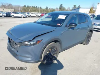 2021 Mazda CX-5 Touring with VIN JM3KFBCM0M0489644, listed as a IAAI auction lot 41756117 with 67,365 mi miles. Bid and sale history available at carsss.com. Image 17.