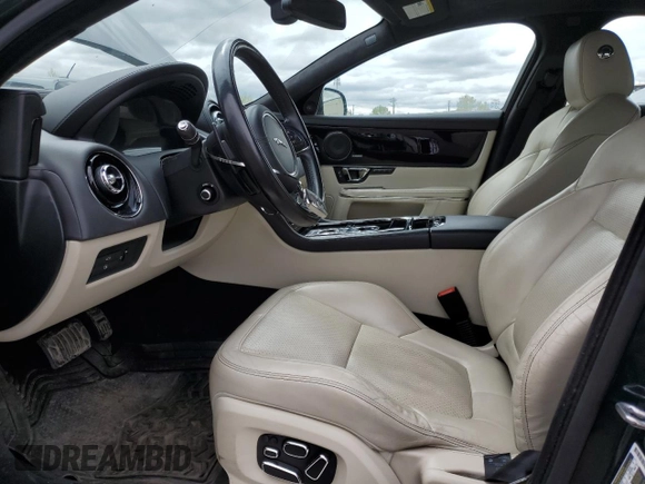 2015 Jaguar XJ Premium Luxury with VIN SAJXJ1CD3F8V88780, listed as a Copart auction lot 57488345 with 62,776 mi miles and Clean Title. Bid and sale history available at DreamBid. Image 7.