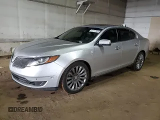 2013 Lincoln MKS z VIN 1LNHL9EK6DG615623, wystawiony jako Copart lot #51247625 z przebiegiem 127 982 mil mil oraz Czysty tytuł • Clean title. Historia ofert i sprzedaży dostępna na DreamBid. Obrazek 1.