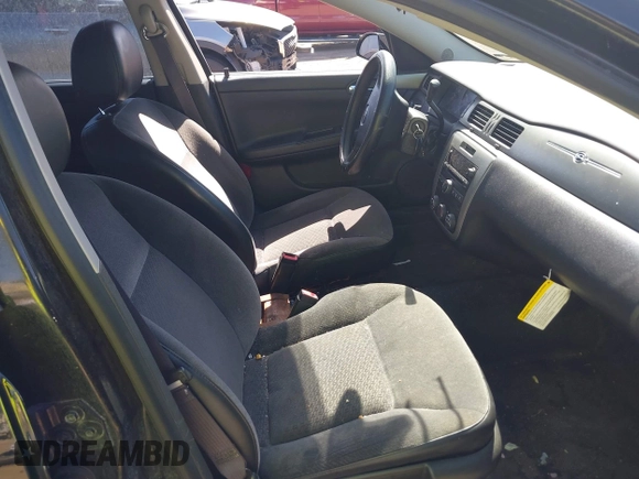 2013 Chevrolet Impala Police z VIN 2G1WD5E31D1256682, wystawiony jako IAAI lot #42276990 z przebiegiem 148 251 mil mil oraz . Historia ofert i sprzedaży dostępna na DreamBid. Obrazek 5.