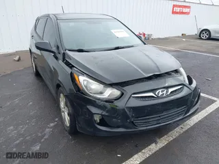 2012 Hyundai Accent SE with VIN KMHCU5AE1CU035390, listed as a IAAI auction lot 41765900 with 127,685 mi miles. Bid and sale history available at carsss.com. Image 6.